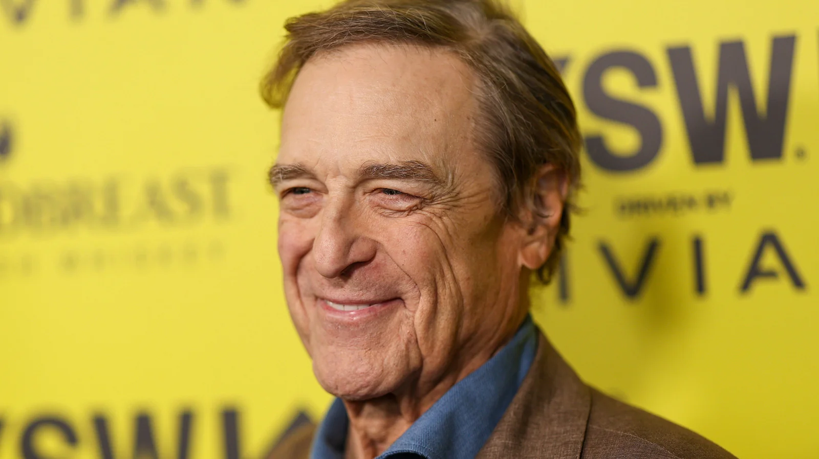 John Goodman sorrindo em evento
